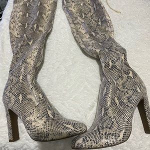 Nude snake skin knee high boots
